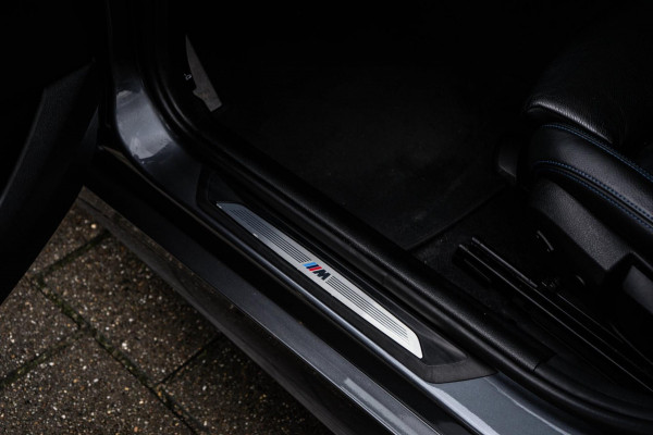 BMW 1-serie 125i M Sport Edition LEER / NAVI / PDC
