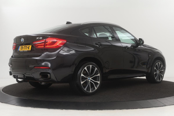 BMW X6 xDrive50i M-Sport | Schuifdak | Head-Up | Stoel & stuurverwarming | Adaptive cruise | Leder | Trekhaak | Navigatie | Memory | Keyless | Full LED | Standkachel