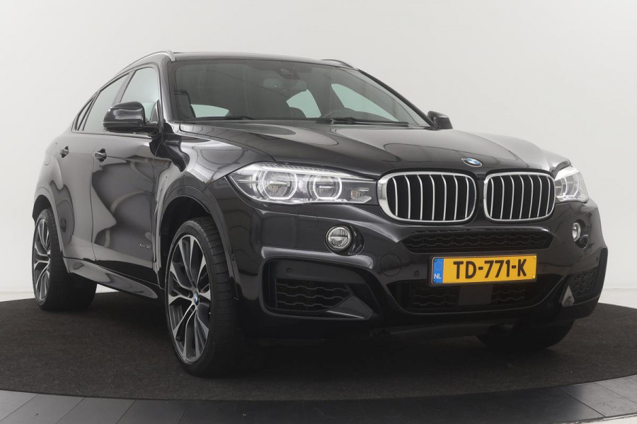 BMW X6 xDrive50i M-Sport | Schuifdak | Head-Up | Stoel & stuurverwarming | Adaptive cruise | Leder | Trekhaak | Navigatie | Memory | Keyless | Full LED | Standkachel