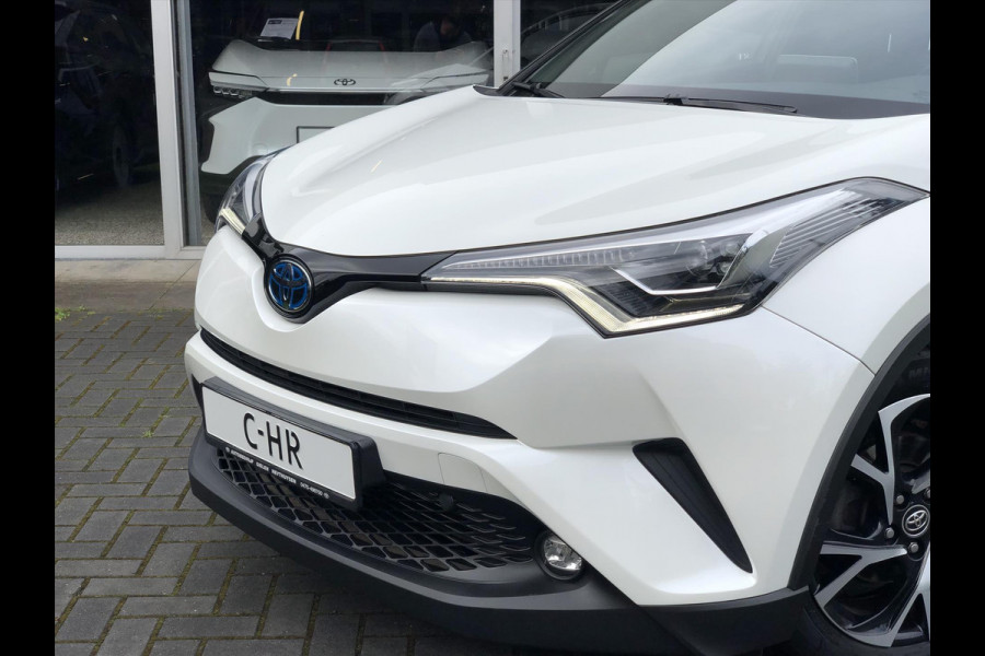 Toyota C-HR 1.8 Hybrid Bi-Tone | Trekhaak, Navigatie, Dodehoekherkenning, Stoelverwarming, 18 inch, Keyless, DAB