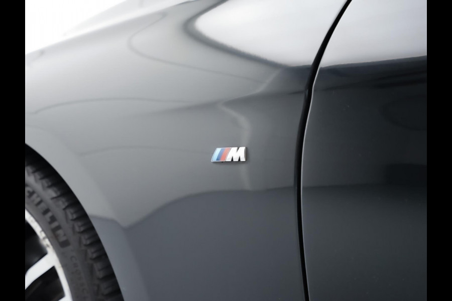 BMW 3 Serie Touring 318i M Sport Shadowline (LED,XENON,AUTOMAAT,LEDER,GROOT NAVI,STOELVERWARMING,PARKEERSENSOR,LM-VELGEN,TOPSTAAT)