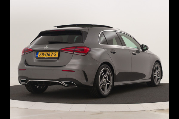 Mercedes-Benz A-Klasse 180 AMG Automaat Panoramadak-schuifdak | Navigatie | AMG Styling | Stoelverwarming | Ledkoplampen | Cruisecontrol | Digitale radio (DAB) | | Nu tijdelijk te financiëren tegen 3,90% rente (actie loopt t/m 15-5-2020)