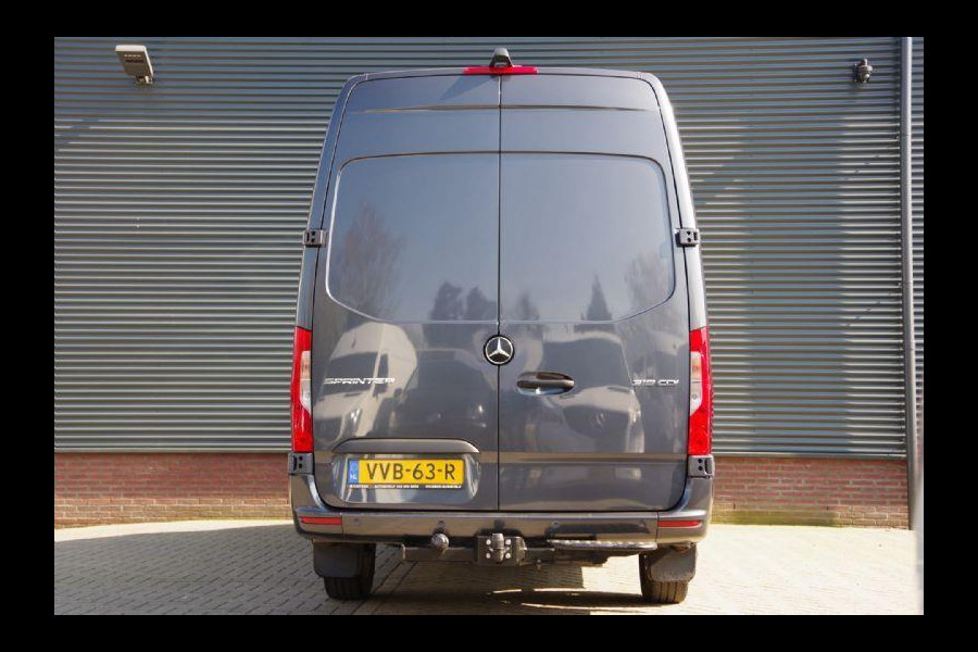 Mercedes-Benz Sprinter 319 3.0 CDI V6 L3H2 AUT-7, LEDER, 3.5T TREKHAAK, CRUISE, MBUX, CAMERA, STANDKACHEL, CLIMA, APPLE CARPLAY/ANDROID AUTO, PARKEERSE