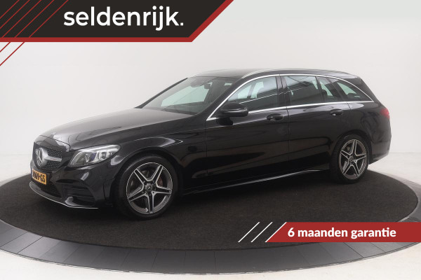 Mercedes-Benz C-Klasse 180 AMG | Carplay | Trekhaak | Stoelverwarming | Camera | Half leder | Full LED | Navigatie | Park Assist | DAB+