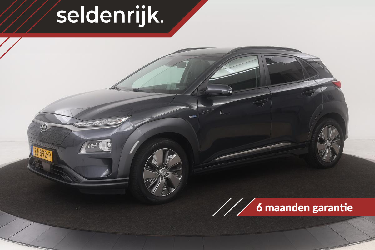 Hyundai Kona EV Premium 64 kWh | Stoelkoeling | Carplay | Head-Up | Leder | Krell | Camera | Full LED | Keyless | Stuurverwarming | Adaptive cruise