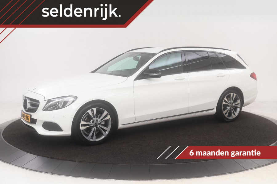 Mercedes-Benz C-Klasse 180 Avantgarde | 35.100km | Stoelverwarming | Zwart optiek | Navigatie | Half leder | Park Assist | Climate control | Cruise control