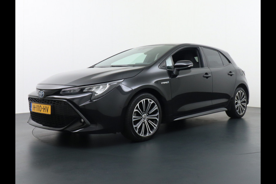 Toyota Corolla 1.8 Hybride AUT. 122PK Miracast MirrorScreen Camera ECC Navi DAB+ Bluetooth Keyless LMV"17 Cruise Control Lane Assist Privacy Gl SmartDeviceLink Multifunct. Lederen-Stw Draadloze Tel.-oplader Mistlampen Leder stw Elec Ramen en Spiegels + inkl. 1e eigenaar, origineel NL auto ! Dealer onderhouden