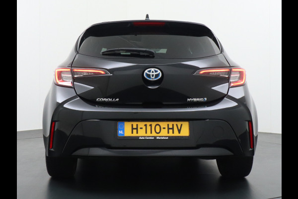 Toyota Corolla 1.8 Hybride AUT. 122PK Miracast MirrorScreen Camera ECC Navi DAB+ Bluetooth Keyless LMV"17 Cruise Control Lane Assist Privacy Gl SmartDeviceLink Multifunct. Lederen-Stw Draadloze Tel.-oplader Mistlampen Leder stw Elec Ramen en Spiegels + inkl. 1e eigenaar, origineel NL auto ! Dealer onderhouden