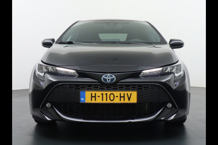 Toyota Corolla 1.8 Hybride AUT. 122PK Miracast MirrorScreen Camera ECC Navi DAB+ Bluetooth Keyless LMV"17 Cruise Control Lane Assist Privacy Gl SmartDeviceLink Multifunct. Lederen-Stw Draadloze Tel.-oplader Mistlampen Leder stw Elec Ramen en Spiegels + inkl. 1e eigenaar, origineel NL auto ! Dealer onderhouden