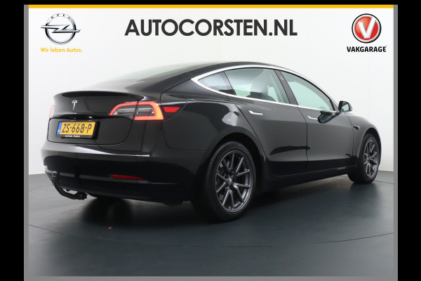 Tesla Model 3 SR+ TREKHAAK Standard RWD Plus 60kwh 325PK AutoPilot 2.5 Leer Premium-l.s. PanoDak Adaptive cruise 18" Camera's Elektr.-Stuur+St WIFI Ecc Navigatiesysteem full map LED Comfortstoel(en) ACC Dual-ECC DAB Voorverwarmen interieur via App Keyless via Telefoonsleutel One-Pedal-Drive Origin. NLse auto ! 1e eigenaar lease 910kg trekvermogen