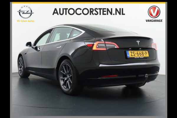 Tesla Model 3 SR+ TREKHAAK Standard RWD Plus 60kwh 325PK AutoPilot 2.5 Leer Premium-l.s. PanoDak Adaptive cruise 18" Camera's Elektr.-Stuur+St WIFI Ecc Navigatiesysteem full map LED Comfortstoel(en) ACC Dual-ECC DAB Voorverwarmen interieur via App Keyless via Telefoonsleutel One-Pedal-Drive Origin. NLse auto ! 1e eigenaar lease 910kg trekvermogen