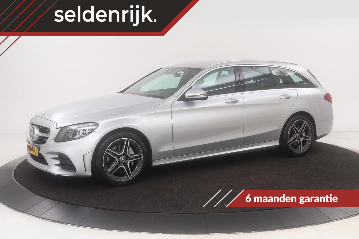 Mercedes-Benz C-Klasse 180 AMG | Carplay | Trekhaak | Stoelverwarming | Camera | Sfeerverlichting | Navigatie | Park Assist | Cruise contol | Full LED