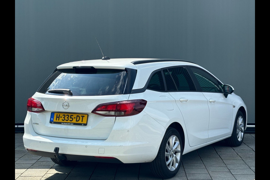 Opel Astra Sports Tourer BWJ 2020 | 1.2i 111PK Business Edition | CLIMA | NAVI | TREKHAAK | CARPLAY | PRIVACY GLASS | LICHTMETAAL | SPORTSTOELEN |