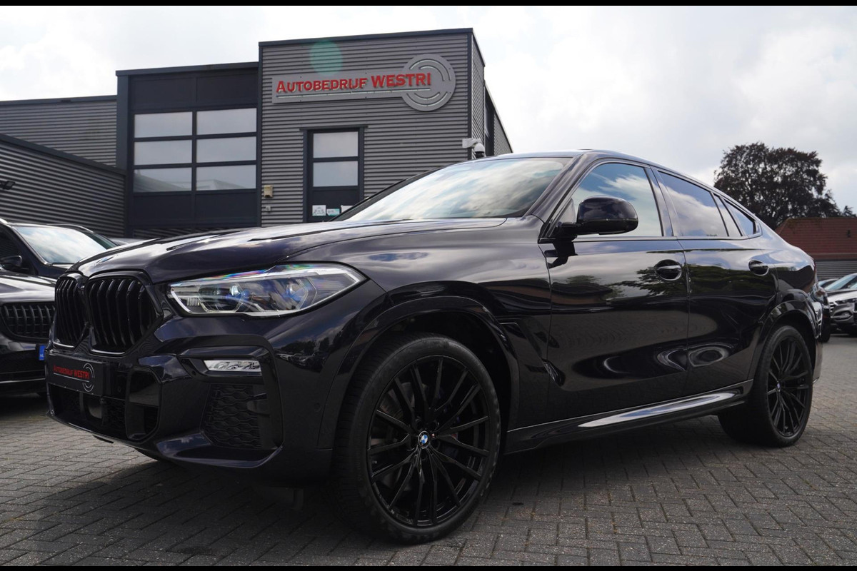 BMW X6 XDrive40i High Executive | Panorama | 360cam | Carbon | Adaptieve cruise control | Kristallen pook | 22 inch | Dealer onder