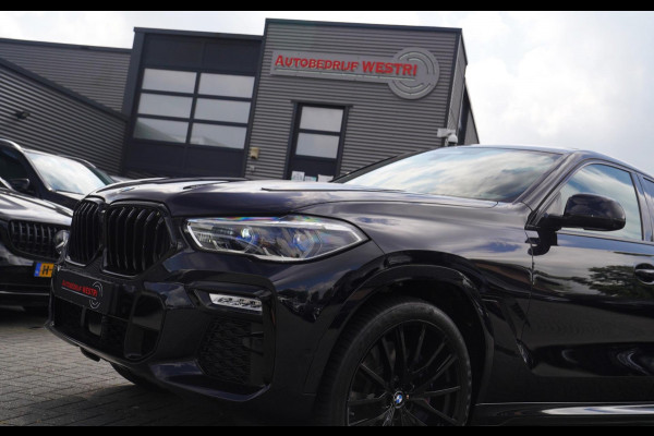 BMW X6 XDrive40i High Executive | Panorama | 360cam | Carbon | Adaptieve cruise control | Kristallen pook | 22 inch | Dealer onder