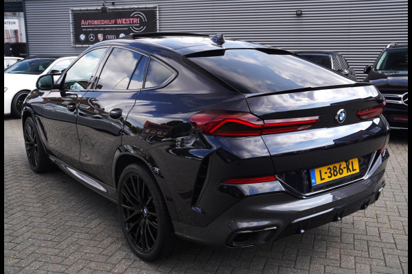 BMW X6 XDrive40i High Executive | Panorama | 360cam | Carbon | Adaptieve cruise control | Kristallen pook | 22 inch | Dealer onder