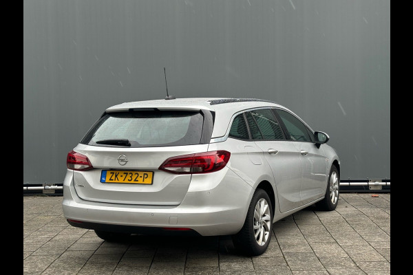 Opel Astra Sports Tourer BWJ 2019 | 1.0 Turbo 105PK Innovation | CLIMA | CAMERA A | CARPLAY | NAVI | EL. KOFFERKLEP | PDC | PRIVACY GLASS | KEYLESS |