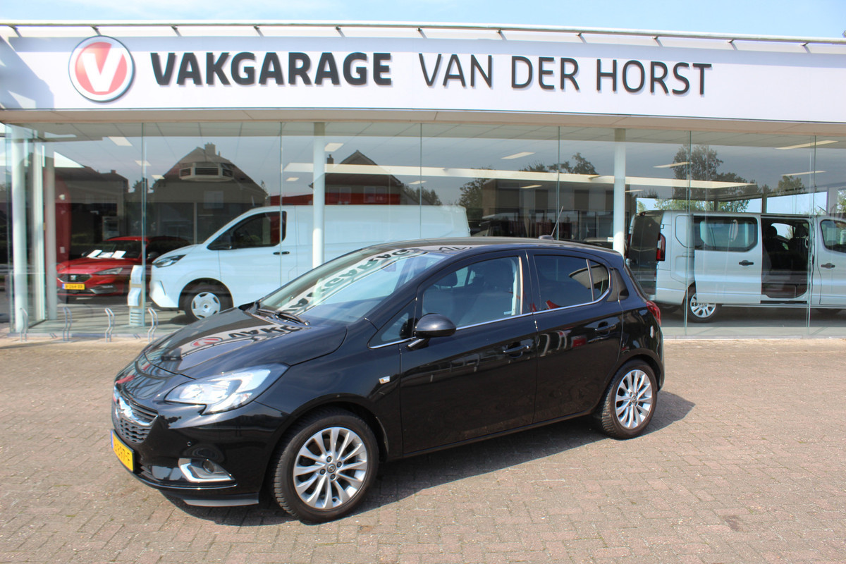 Opel Corsa 1.0-90pk Turbo 'Online Edition'. Erg nette en goed onderhouden Opel Corsa 1.0-90pk Turbo 5drs.. Volautm. airco, cruise control, navigatie, trekhaak afneembare kogel, metallic lak, parkeersensoren v+a, LM wielen, telefoonvoorb., 5 deuren etc.