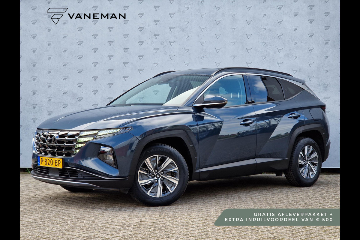 Hyundai Tucson 1.6 T-GDI HEV Automaat | Camera | Navi | Clima | Stoelverwarming | Apple CarPlay/Android Auto | 17" Velgen | PDC | Cruise | LED |