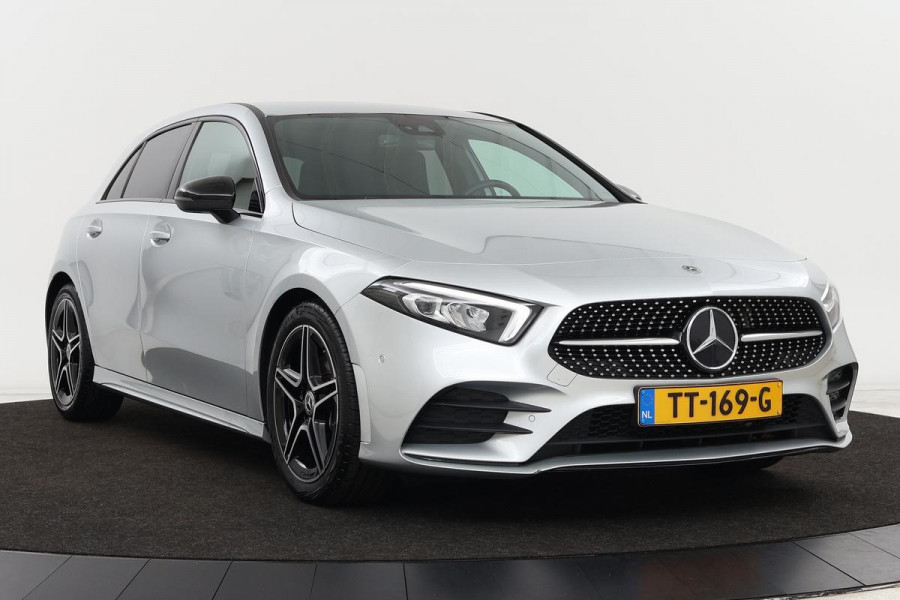 Mercedes-Benz A-Klasse 180 AMG | 57.000km NAP | DAB+ | Stoelverwarming | Widescreen | Camera | Full LED | Half leder | Navigatie | Park Assist