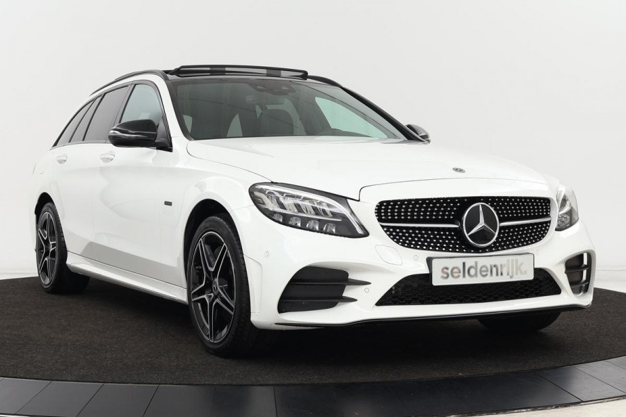 Mercedes-Benz C-Klasse 300e AMG | Panoramadak | Carplay | Lane Assist | Stoelverwarming | Sfeerverlichting | DAB+ | Keyless | Navigatie | Full LED