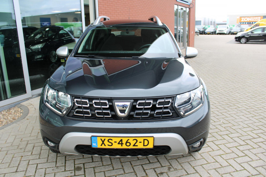 Dacia Duster 1.6 SCe 115 PK Prestige LPG | Trekhaak | Climate Control | Navigatie | Camera | Cruise Control | DAB | Lichtmetalen Velgen | Privacy Glass | Dealeronderhouden