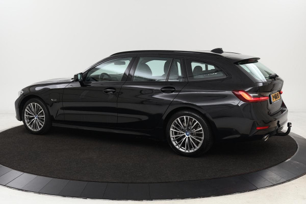 BMW 3-serie 320e Business Edition Plus | Camera | Trekhaak | Park Assist | Leder | Carplay | Stoelverwarming | Full LED | Navigatie