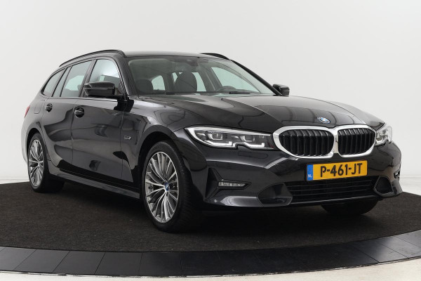 BMW 3-serie 320e Business Edition Plus | Camera | Trekhaak | Park Assist | Leder | Carplay | Stoelverwarming | Full LED | Navigatie