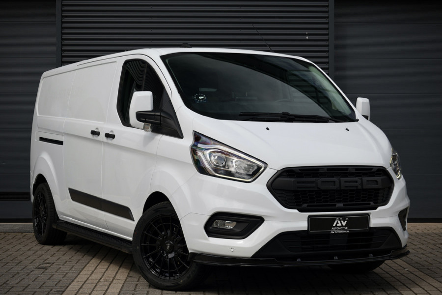 Ford Transit Custom 300 2.0 TDCI L2H1 | Camera | CarPlay | Raptor Edition | Stoelverwarming | Trekhaak | 3-Zitter | Nieuwe APK | Onderhoudsbeurt