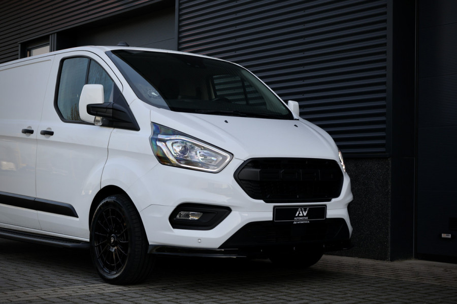 Ford Transit Custom 300 2.0 TDCI L2H1 | Camera | CarPlay | Raptor Edition | Stoelverwarming | Trekhaak | 3-Zitter | Nieuwe APK | Onderhoudsbeurt