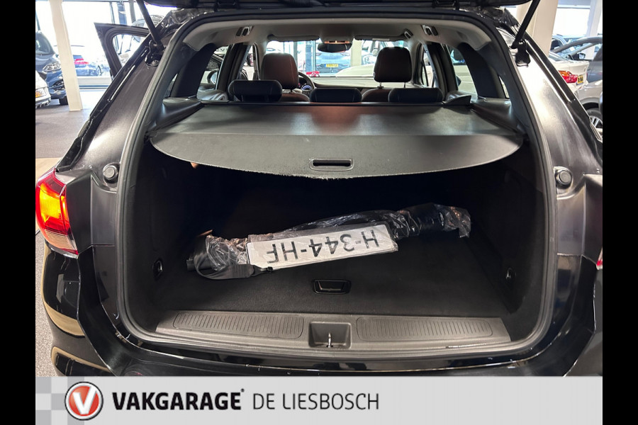 Opel Astra Sports Tourer 1.2 Business Edition navigatie / cruise control / pdc / boeken / afn trekhaak / nieuwe distributie