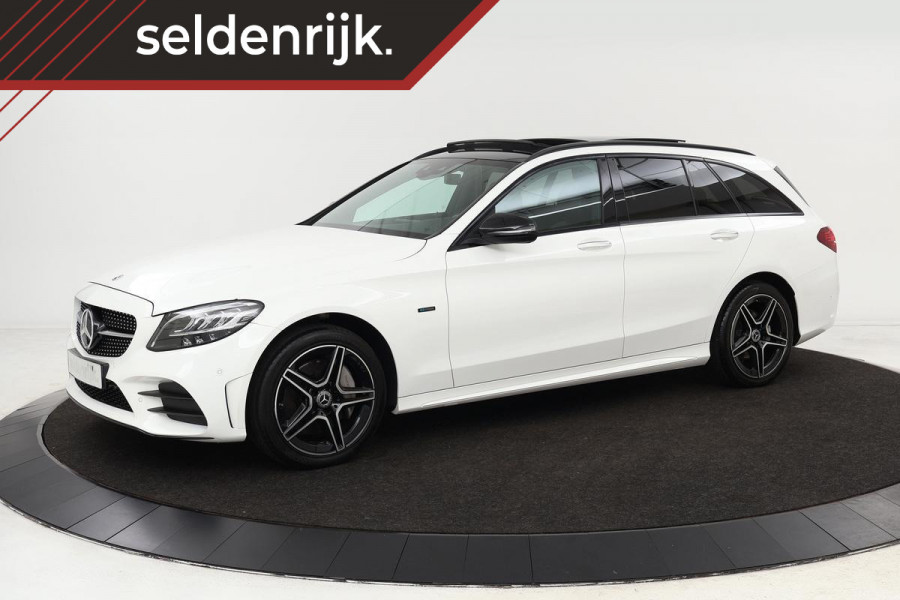 Mercedes-Benz C-Klasse 300e AMG | Panoramadak | Carplay | Lane Assist | Stoelverwarming | Sfeerverlichting | DAB+ | Keyless | Navigatie | Full LED