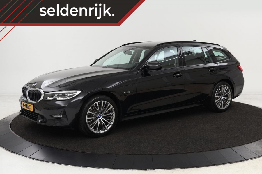 BMW 3-serie 320e Business Edition Plus | Camera | Trekhaak | Park Assist | Leder | Carplay | Stoelverwarming | Full LED | Navigatie