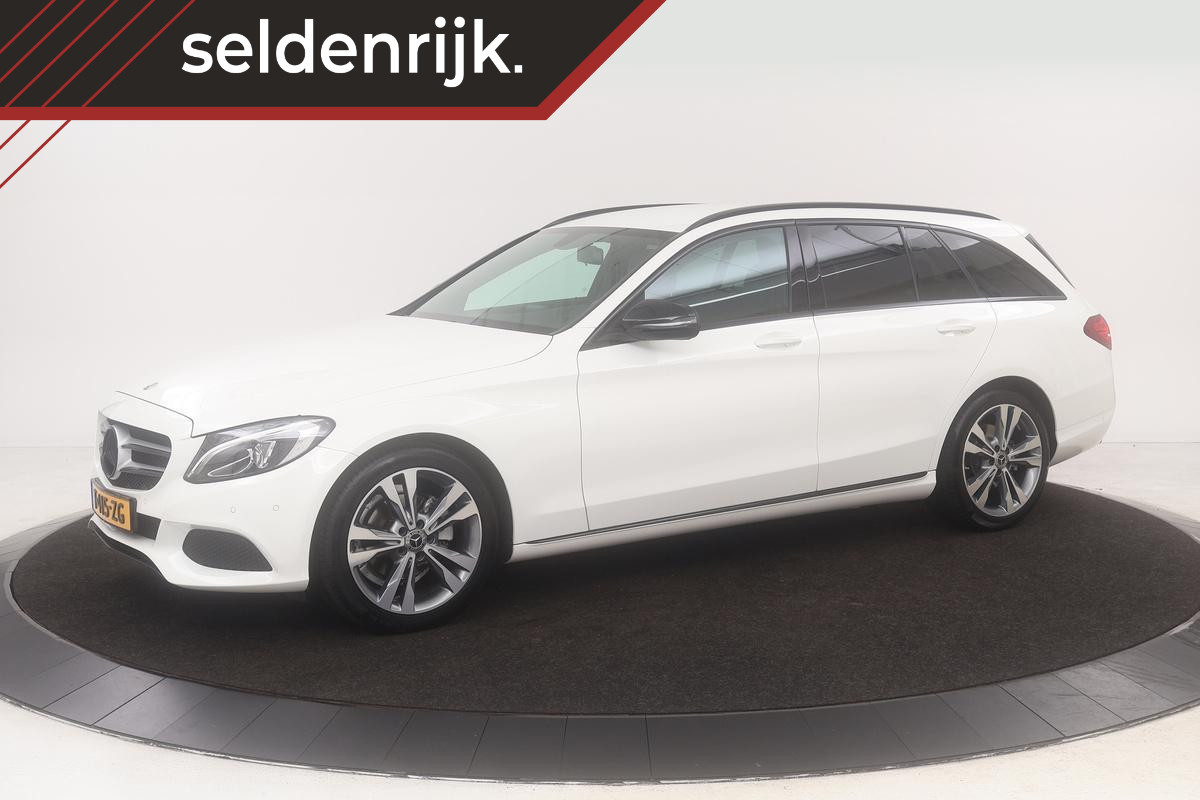 Mercedes-Benz C-Klasse 180 Avantgarde | 35.100km | Stoelverwarming | Zwart optiek | Navigatie | Half leder | Park Assist | Climate control | Cruise control