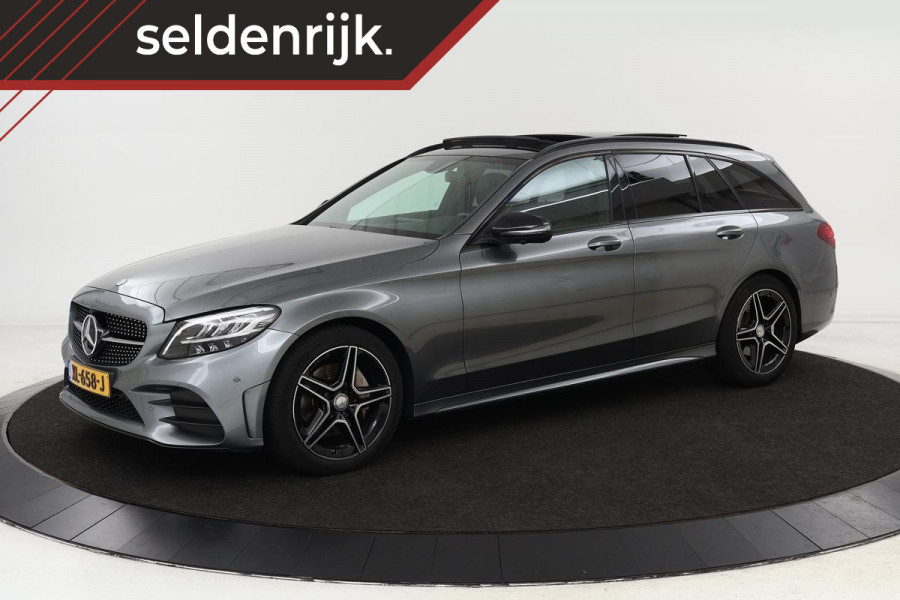 Mercedes-Benz C-Klasse 180 AMG | Panoramadak | 360 Camera | Trekhaak | Stoelverwarming | Navigatie | Full LED | Half leder | Park Assist