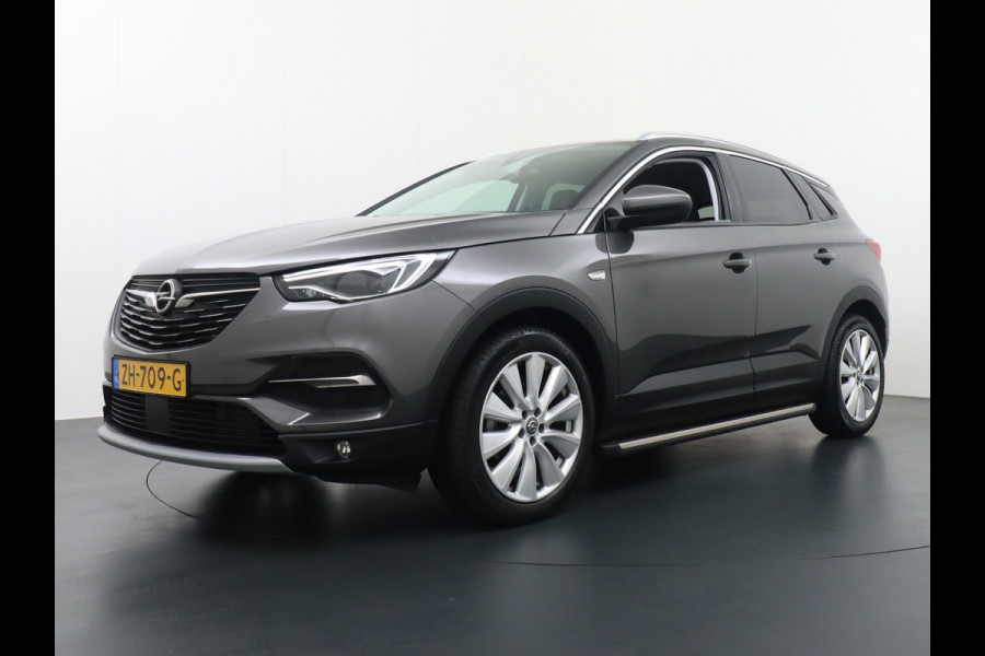 Opel Grandland X T131PK Apple Carplay Android Auto PDC Navi AGR Keyless 19" DAB+ ECC Bluetooth 1/2 Leer Privacy Glas LMV Regen-Licht Sensor Cruis Leder-Stw Elec-ramen en Spiegels Business Executive 100% Dealer Onderhouden, laatste beurt bij 83.058km gehad Orig.NLse auto