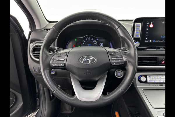 Hyundai Kona EV Premium 64 kWh (INCL-BTW) *PANO | FULL-LEATHER | HEAD-UP | FULL-LED | NAVI-FULLMAP | DAB | ADAPTIVE-CRUISE | KRELL-AUDIO | KEYLESS | CAMERA | BLIND-SPOT | LANE-ASSIST | DIGI-COCKPIT | COMFORT-SEATS | 17''AL