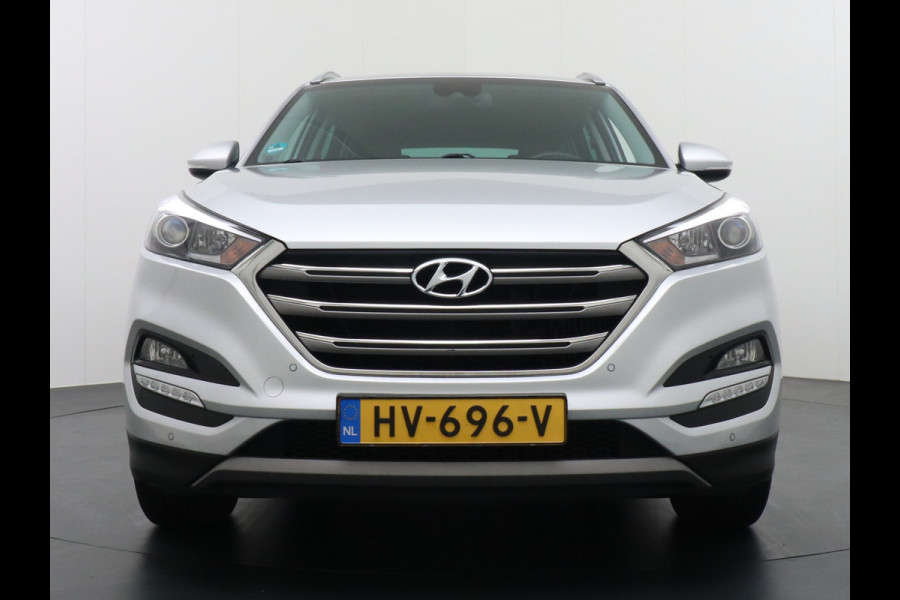 Hyundai Tucson AUTOM.T177pk Leer Camera Navi Trekhaak PDC-a+v Dual-ECC DAB StoelVerwarmd 17" Verkeersbord detectie 1.6 T-GDi Comfort 4WD Spoorwisselassistent Rijstrooksensor Voorruit+Sproeier+wissers-Verwarmd Stoel+bank-Verwarmd Licht+RegenSensor Voetgangersbescherm Privacy-Glas Dashboardvak koeling DBC ESP AWD 4x4 ideale cara EURO6 Orig.NL auto