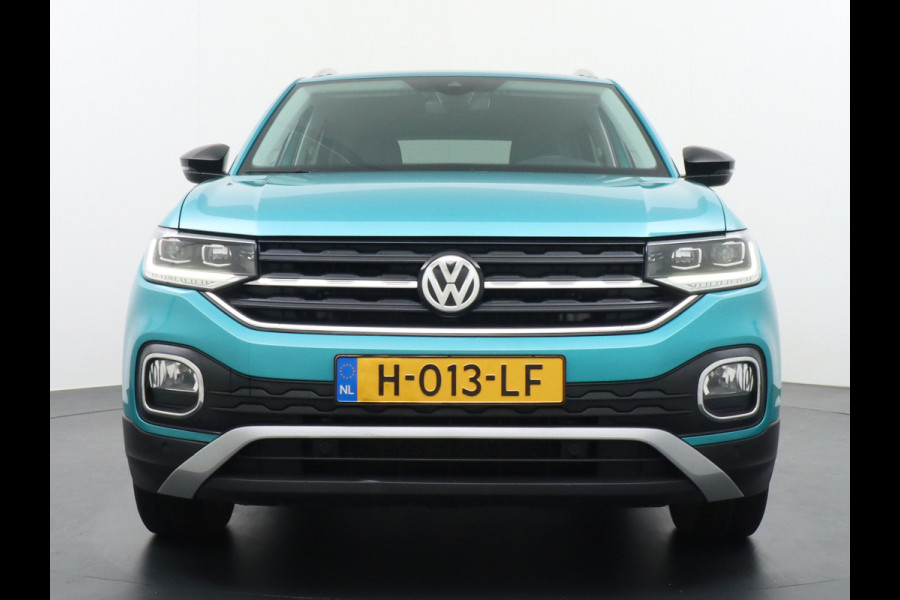 Volkswagen T-Cross T 116Pk 1/2 Leer Adaptive-Cruise Apple Carplay Android MirrorLink Camera Virtual-Cockpit (DigiDash) PDC-A+Voor Dual-ECC 17"lm Do ACC Uitparkeerwaarschuwing Executive-Pakket WiFi Online-Diensten Inklapbare+Verwarmde-Elektr.Spiegels Mistlampen Vermoeidheidsherkenning Smartphone-Integratie Chroompack Licht+regensensor Bra Orig. NLse auto 1e eigenaar Dealer onderhouden ! EURO 6 Nieuw ruim 31.000 euro!