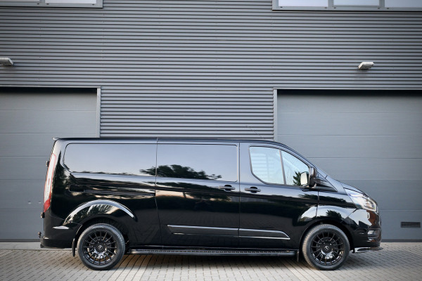 Ford Transit Custom 320 2.0 TDCI 170PK AUT L2H1 Limited | L+R Schuifdeur | Navigatie | Camera | CarPlay | Raptor Edition | Stoelverwarming | Trekhaak | 3-Zitter | Nieuwe APK | Onderhoudsbeurt