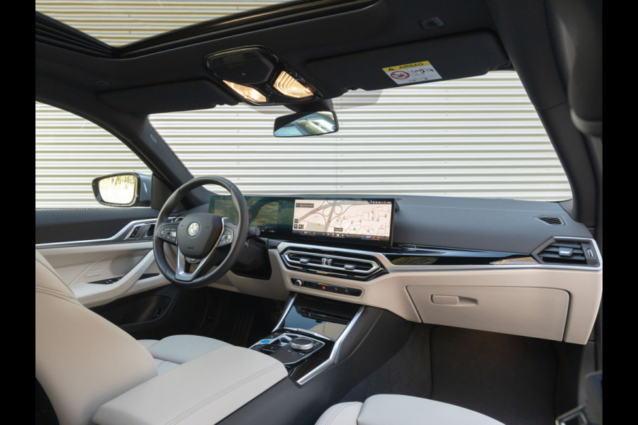 BMW i4 eDrive40 - Dak - Camera - Stoel + Stuurwiel Verwarmd - Leder Interieur