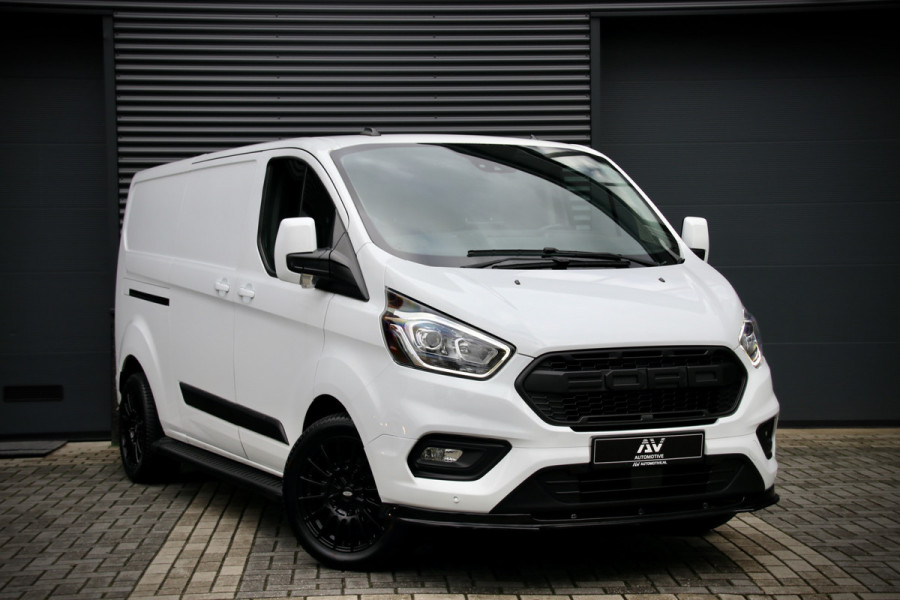 Ford Transit Custom 300 2.0 TDCI L2H1 170PK | Camera | CarPlay | Raptor Edition | Stoelverwarming | Trekhaak | 3-Zitter | Nieuwe APK | Onderhoudsbeurt