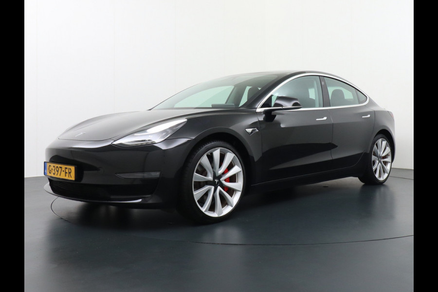 Tesla Model 3 Performance 513pk 3,4 sec 0-100 ! 20"lm FSD-vb. AutoPilot Carbon-Spoiler Premium-HiFi Pano.dak Camera Leer Adaptive-Cruise+Stop& 4wd Rode Remklauwen Premium Audio Veel grip door 4WD vierwielaandrijving.  Origineel Nederlandse auto ! Orig.NL auto  1e eigenaar