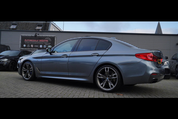 BMW 5 Serie M550d xDrive High Executive | Panorama | Bluestone Metallic | Luxe Nappa Leder | Sfeerverlichting | Camera | NAP |