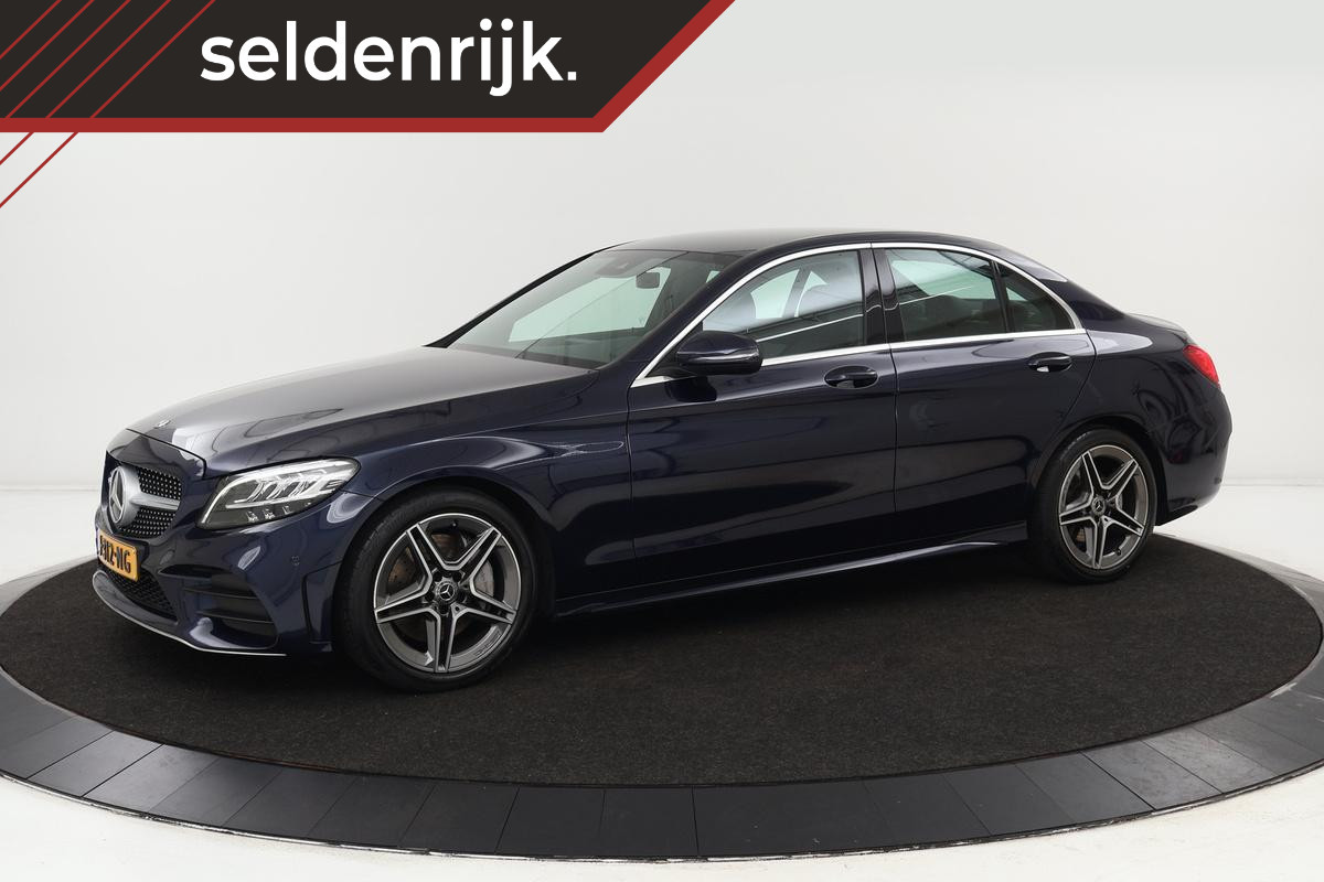 Mercedes-Benz C-Klasse 300 AMG | Adaptive cruise | Stoelverwarming | Carplay | Trekhaak | Navigatie | Half leder | Full LED | Dubbel glas