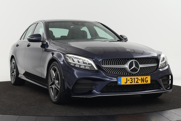 Mercedes-Benz C-Klasse 300 AMG | Adaptive cruise | Stoelverwarming | Carplay | Trekhaak | Navigatie | Half leder | Full LED | Dubbel glas