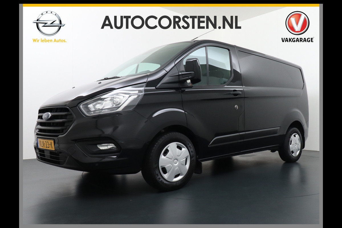 Ford Transit Custom 2.0D 130PK3pers. Airco PDC-a+v Trekhaak Cruise-Controle voorruit verwarmbaar Betonplex Schuifdeur-r Tussenwand voorruit verwarmb Adaptieve bochtverl. Projector-koplamp mistlampen regen-/lichtsensor Dieselroetfilter Supervergrendeling EURO 6 385Nm 2.500kg Trekvermogen!