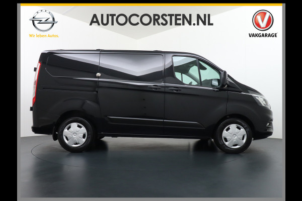 Ford Transit Custom 2.0D 130PK L1H1 3pers. Airco PDC-a+v Trekhaak Cruise-Controle voorruit verwarmbaar Betonplex Schuifdeur-r Tussenwand voorruit ve Adaptieve bochtverl. Projector-koplamp mistlampen regen-/lichtsensor Dieselroetfilter Supervergrendeling EURO 6 385Nm 2.500kg Trekvermogen!