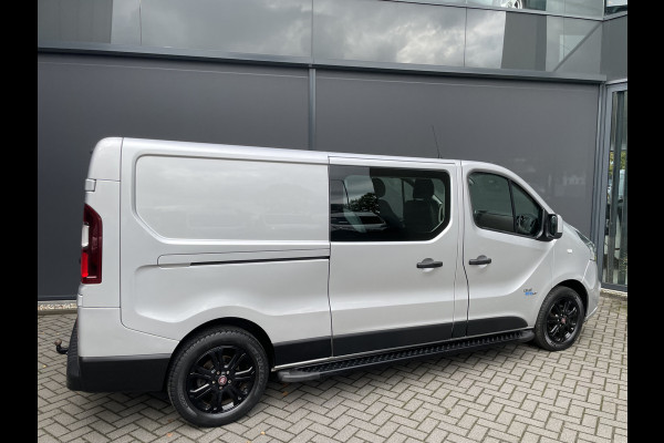 Fiat Talento 1.6 MJ EcoJet L2H1 DC SX Climate control - Cruise control - Parkeer sensoren achter - Navigatie - Radio/CD/MP3 - USB/AUX - DAB - Bluetooth - Achteruitrij camera - sidebars - zonnescherm zijruiten - MFL Stuurwiel - Mistlampen - Licht metalen velgen - Trekhaak - Ramen electrisch voor - Spiegels elektrisch verstel en verwarm - laadvloer - tussenschot volledig - zijschuifdeur R. - B-stoel