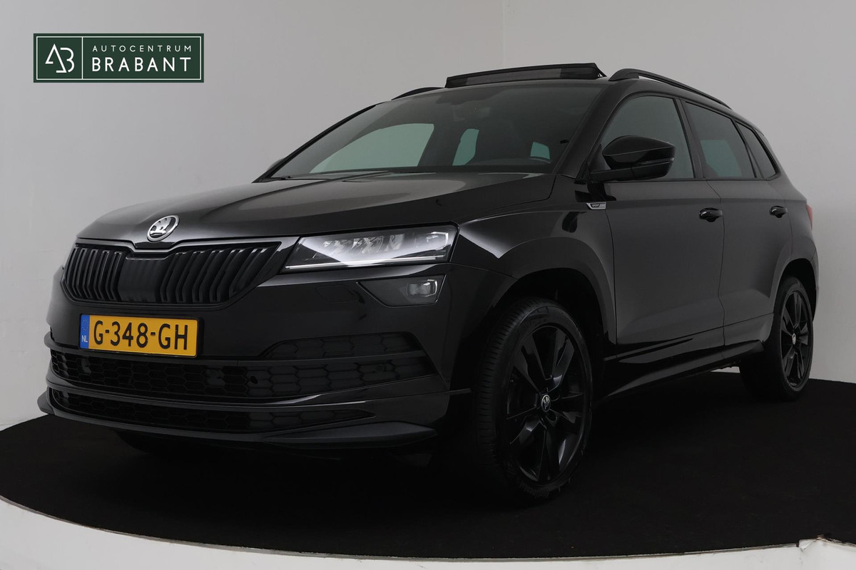 Škoda Karoq 1.5 TSI ACT Sportline Business Automaat (PANORAMADAK, VIRTUAL, TREKHAAK, CAMERA, PDC, NAVI, NL-AUTO, GOED ONDERHOUD)